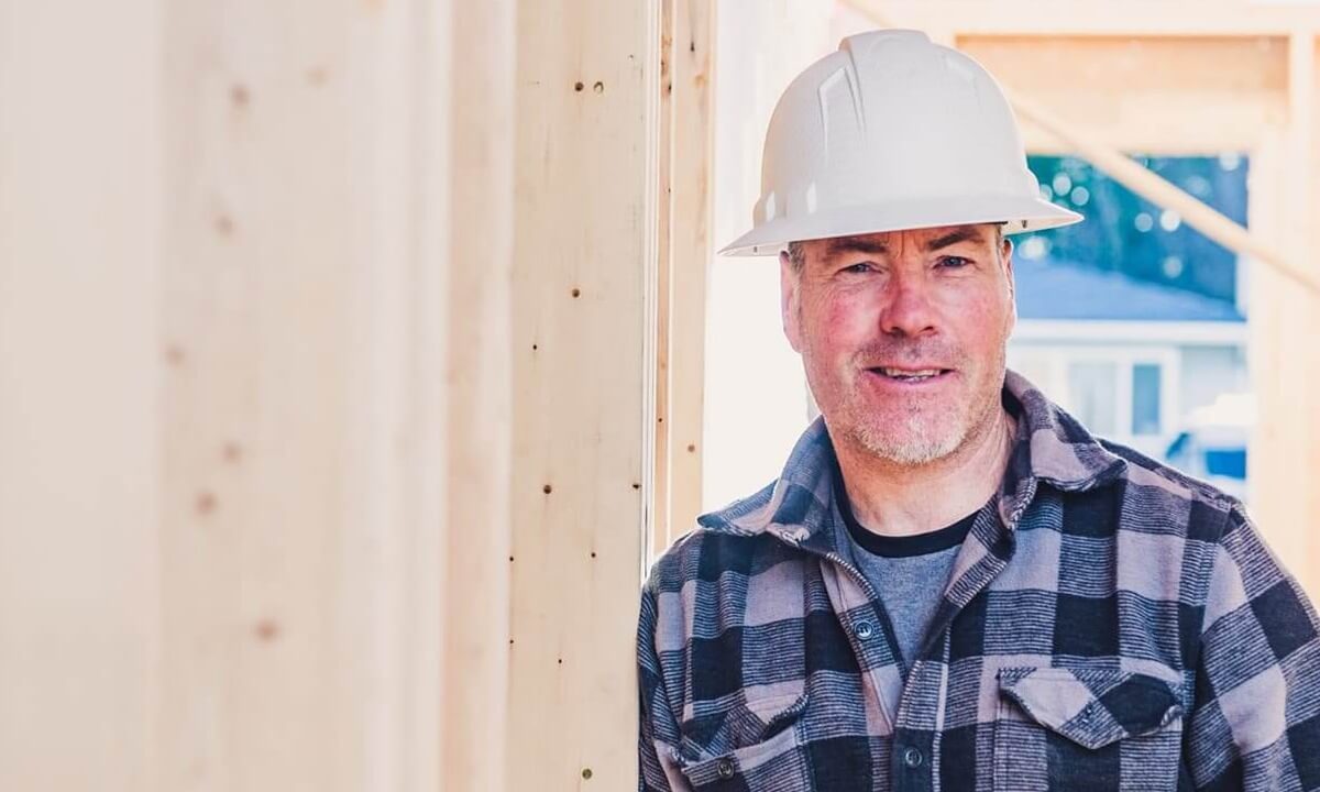 Bromar Construction Owner/Contractor Dan Marinier wearing a hard hat on a job site